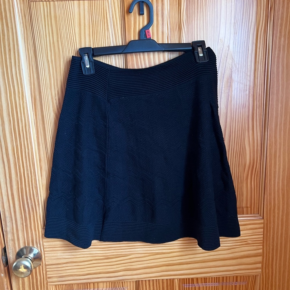 Max Studio black cloth skirt. Size large. Brand new with tags.